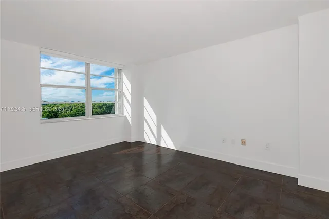 an empty room with a window