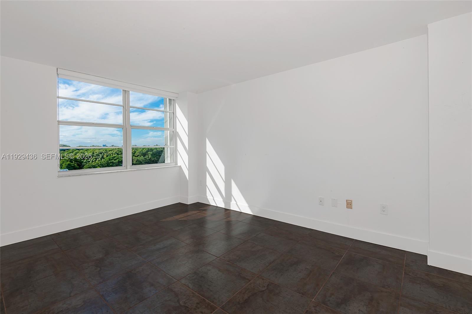 150 Southeast 25th Road, Unit 7J Miami, FL 33129 - Photo 20 of 29 an empty room with a window