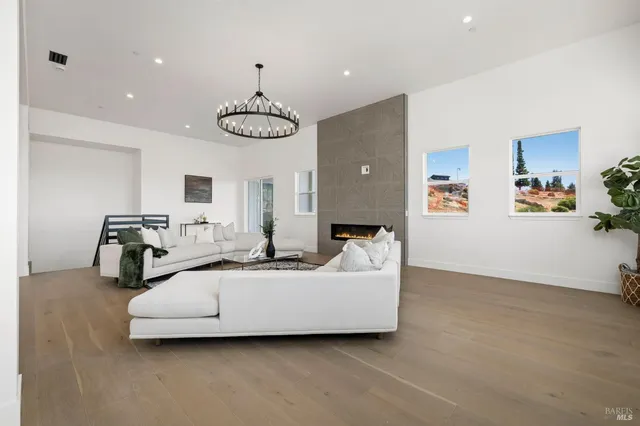 a view of living room with furniture and window