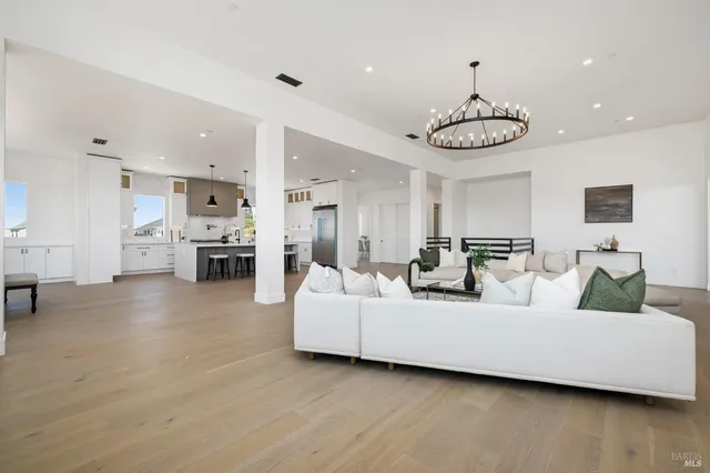 a living room with furniture and a table
