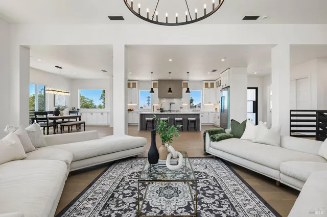 a view of a workspace with furniture and a potted plant