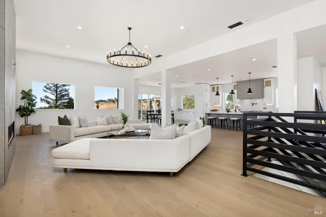 a bathroom with a sink mirror vanity and toilet