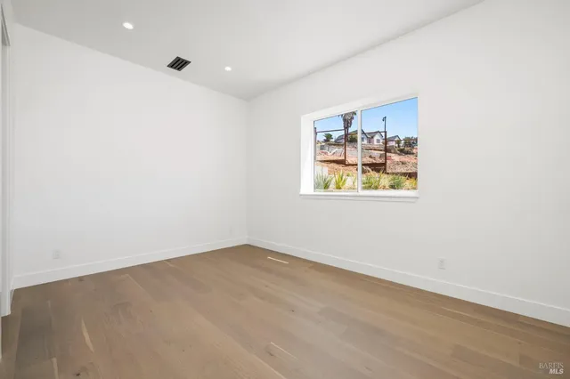 a living room with furniture and a gate