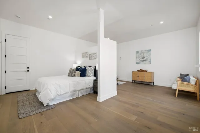 an aerial view of a house with a ocean view