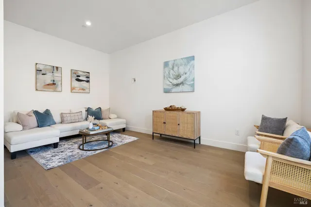 an aerial view of a house with a backyard