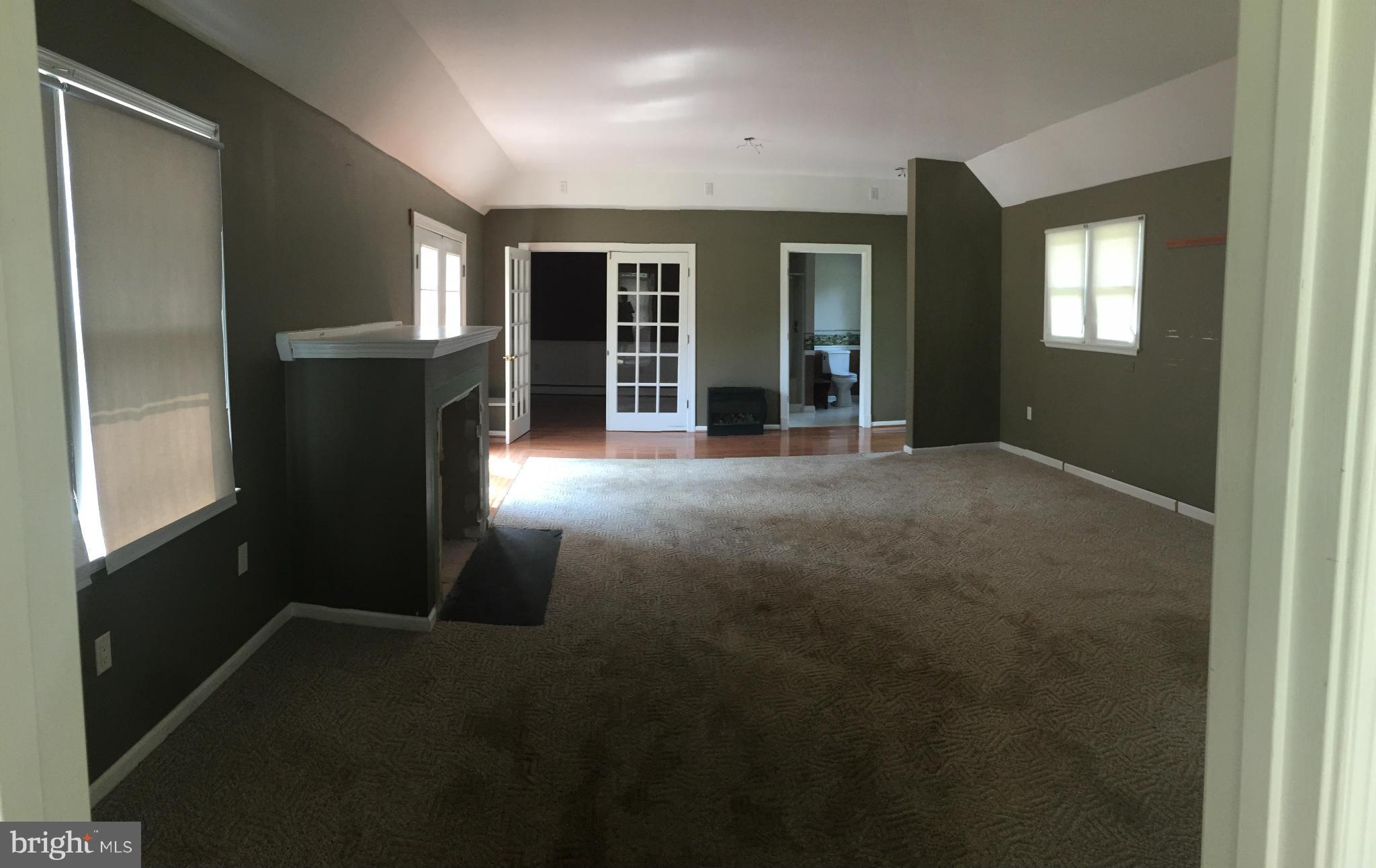 9395 Legion Road Denton, MD 21629 - Photo 8 of 21 a view of empty room with windows