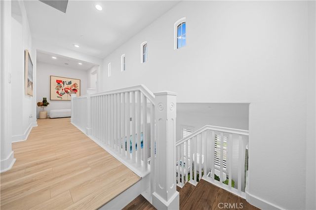 a view of a hallway with staircase