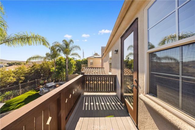 an aerial view of residential houses with yard