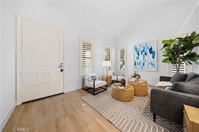 a bedroom with furniture and a bathtub