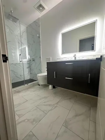 a living room with a couch and a flat screen tv