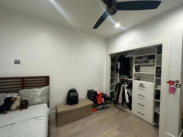 a livingroom with furniture and closet