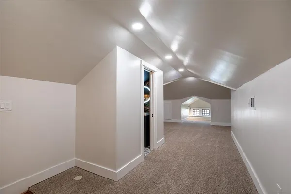 a view of an empty room and a windows