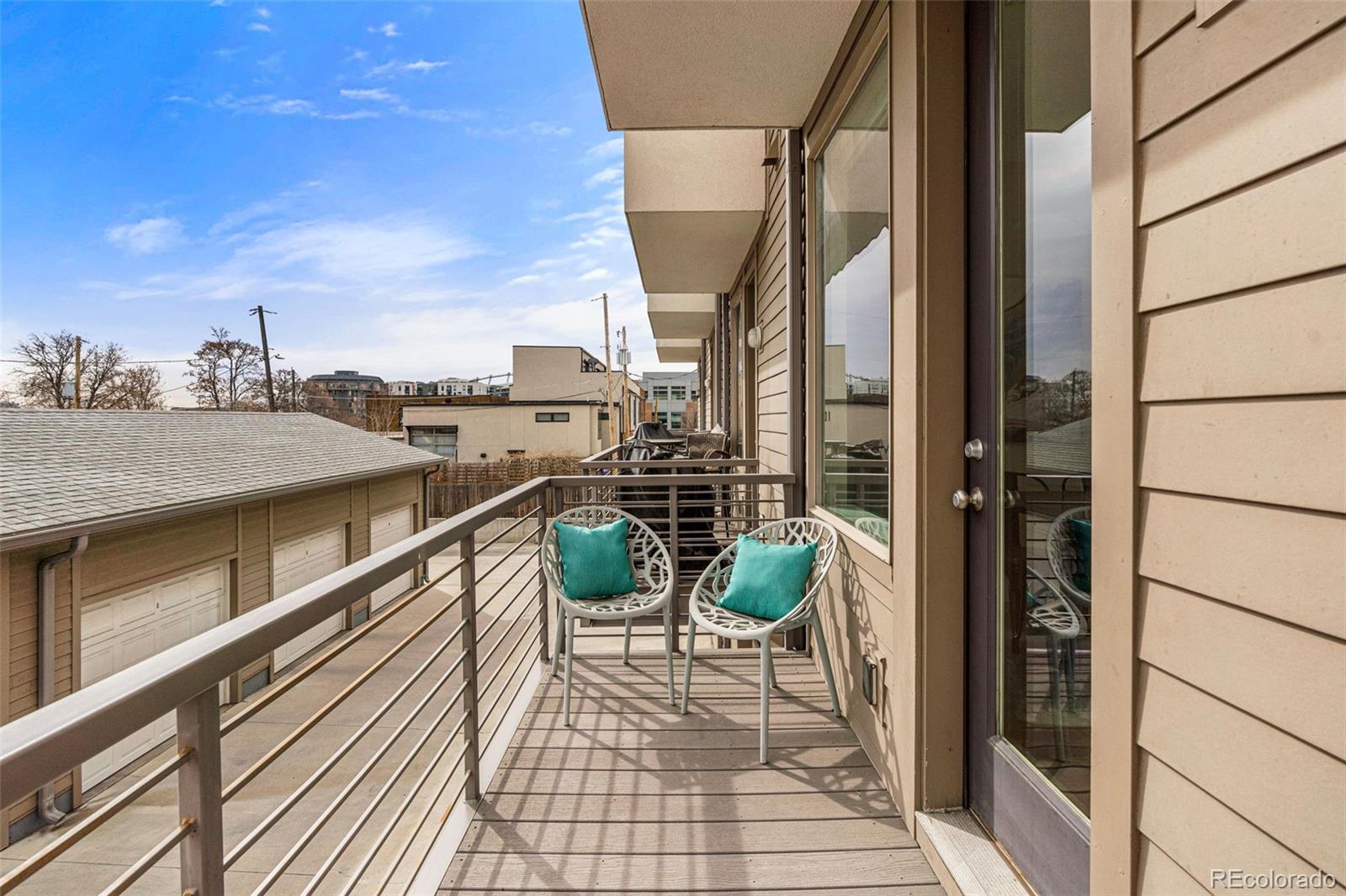 2146 Decatur Street Denver, CO 80211 - Photo 5 of 21 a balcony with furniture and a table