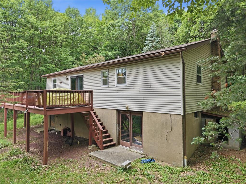 520 Highland Hill Road Jim Thorpe, PA 18235 - Photo 50 of 83 A private wooded setting surrounds this home, complete with a generous rear deck and walk-out lower level access.