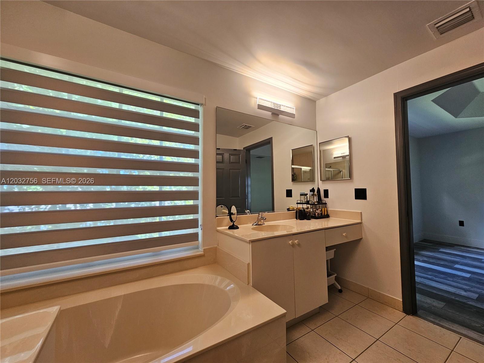 4331 Southwest 124th Way Miramar, FL 33027 - Photo 16 of 40 a room with a sink cabinets and appliances