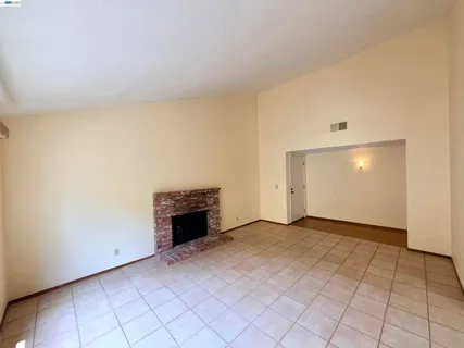a kitchen with stainless steel appliances granite countertop a sink and a stove