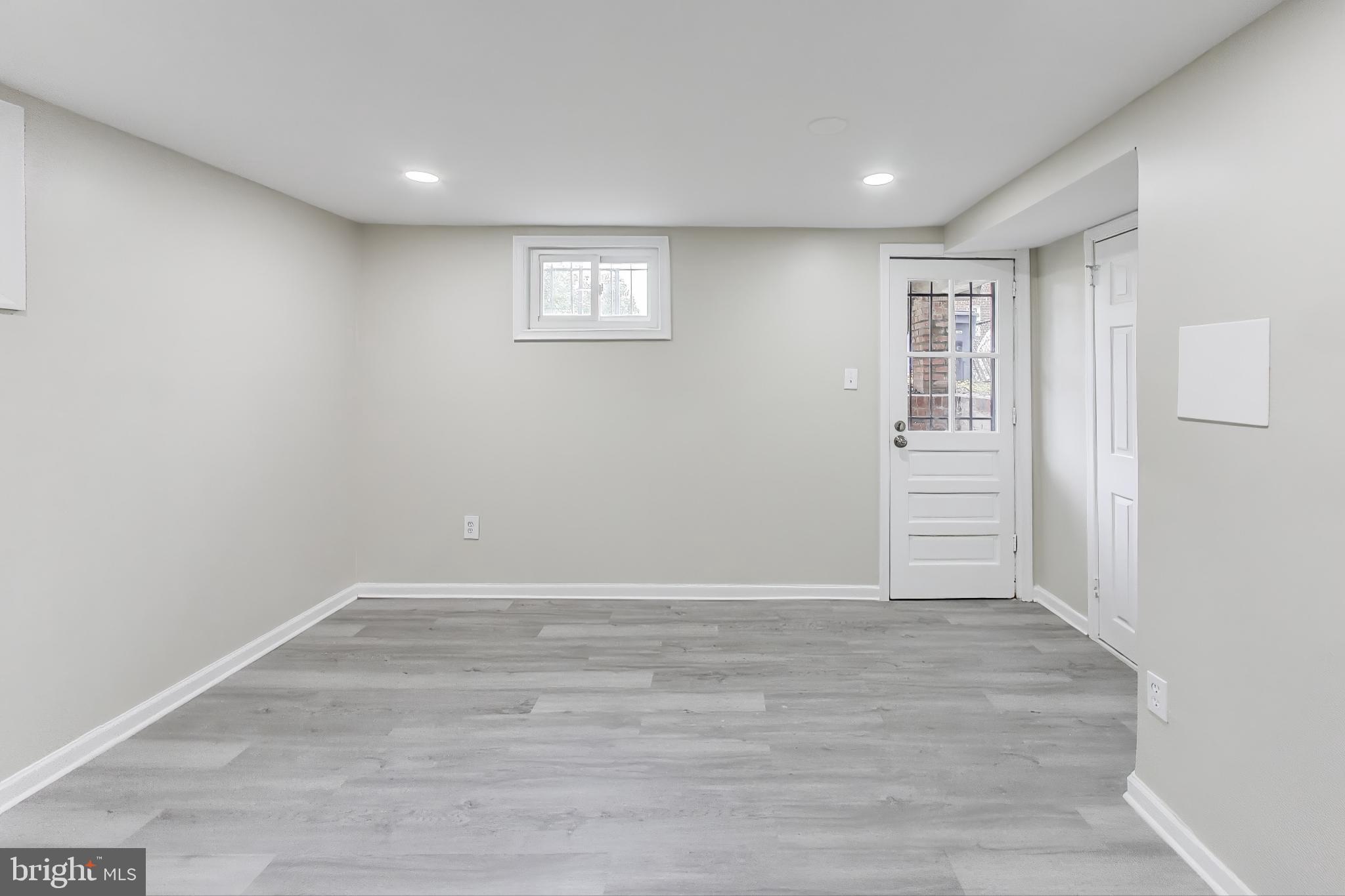 1700 Fort Davis Street Southeast Washington, DC 20020 - Photo 34 of 56 Bsmt Bedroom, Adj. Full Bath, Rear Exit to Yard