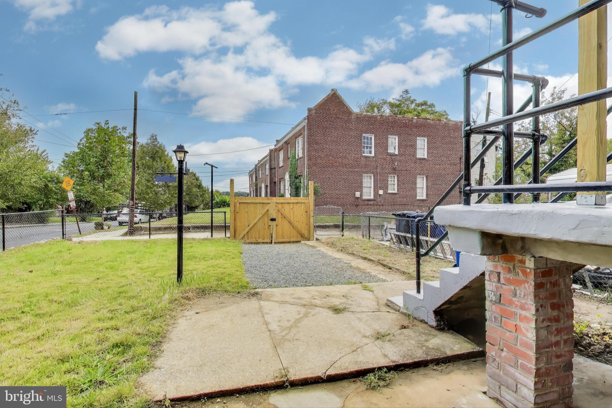 1700 Fort Davis Street Southeast Washington, DC 20020 - Photo 35 of 56 Rear Walk up to Patio and Rear Yard