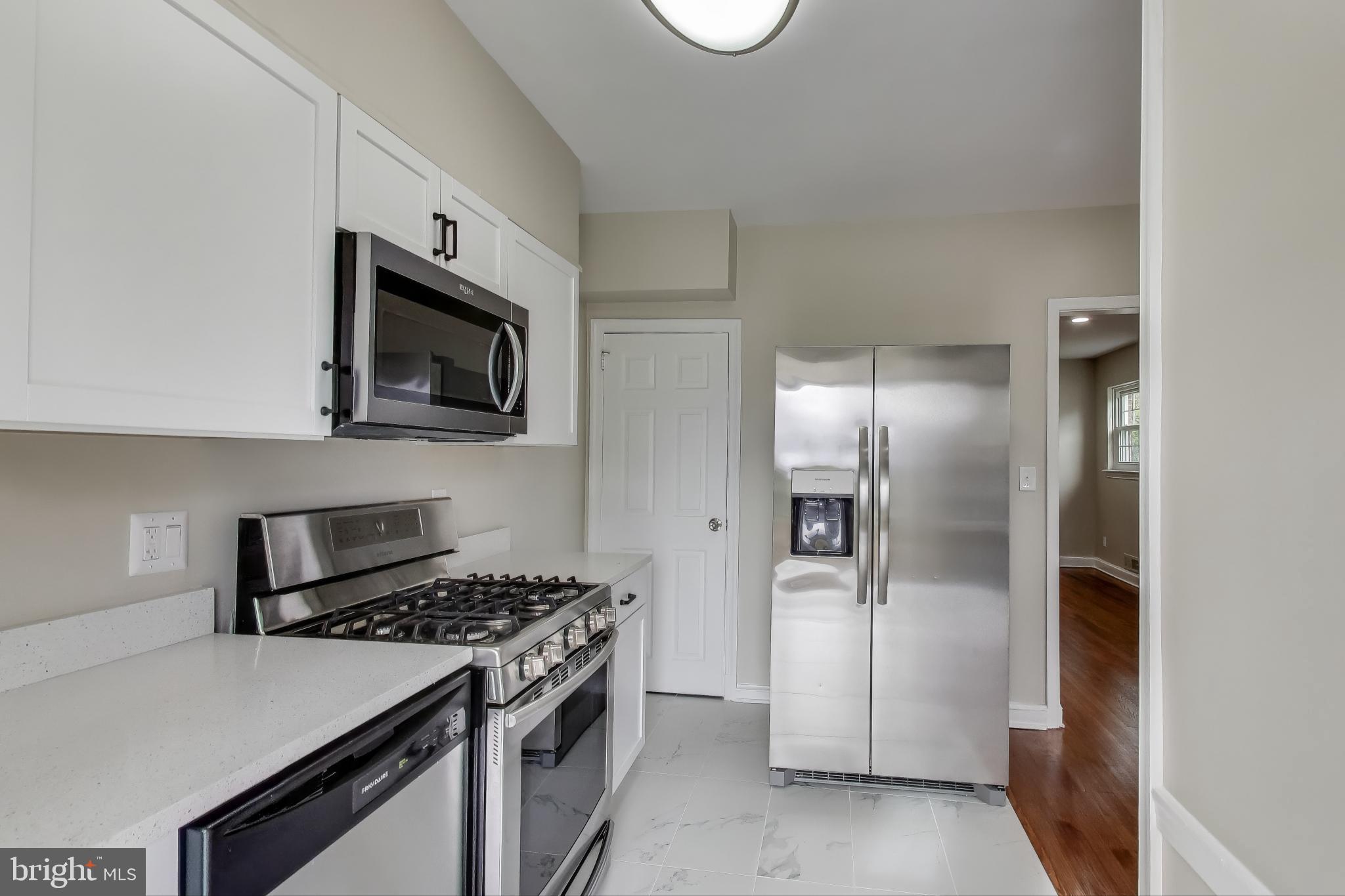 1700 Fort Davis Street Southeast Washington, DC 20020 - Photo 6 of 56 Kitchen Stainless Steel Appliances, Basement Door