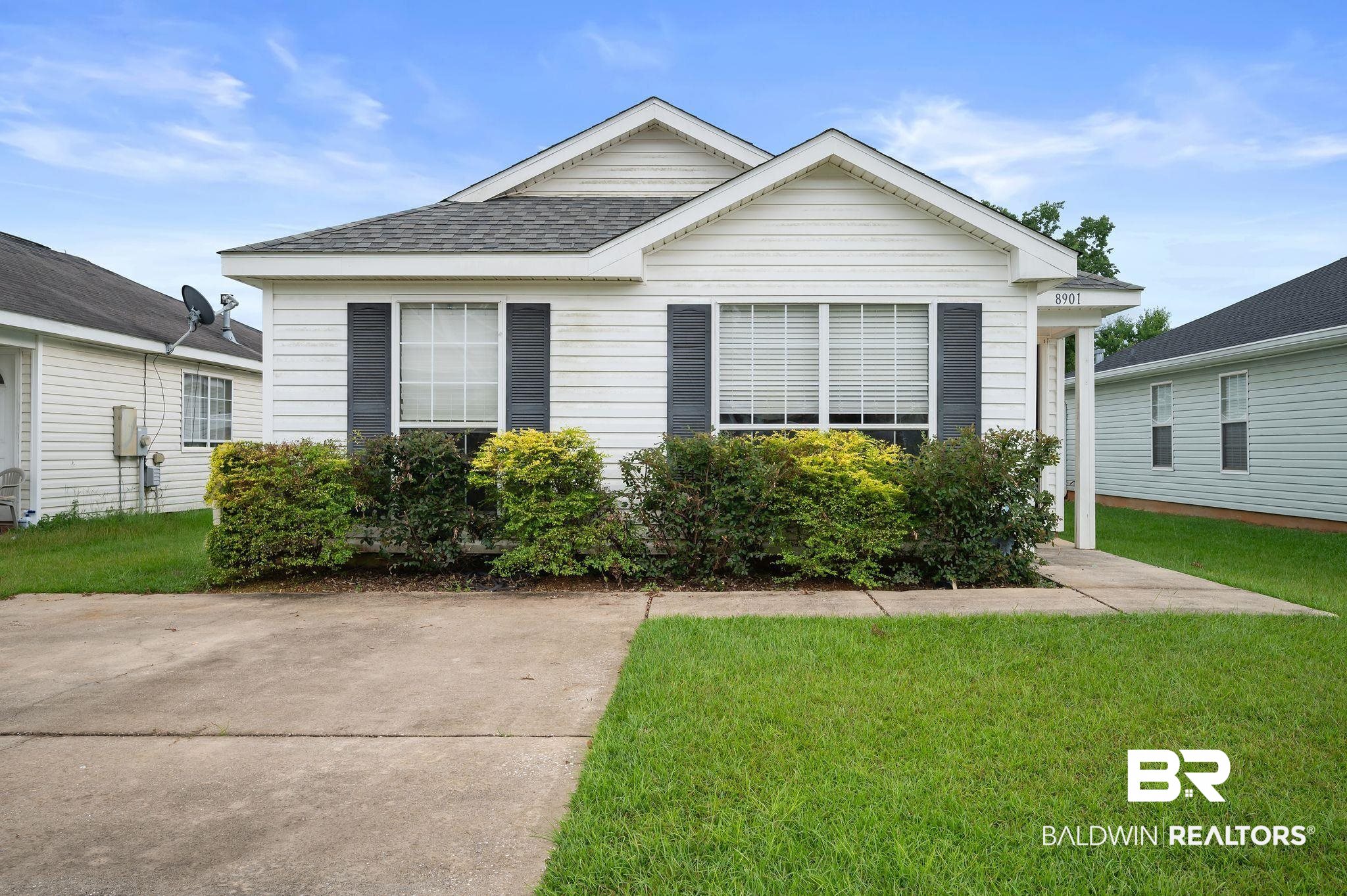 8901 Fall Court Mobile, AL 36695 - Photo 1 of 23 View of front facade with a front lawn and roof with shingles