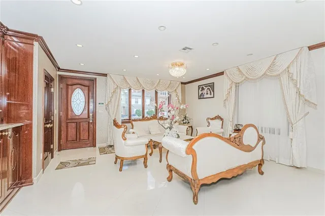 a spacious bedroom with a bed and window