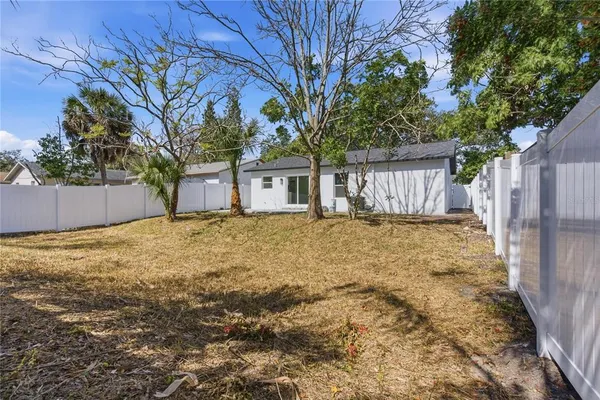 a house with trees in front of it