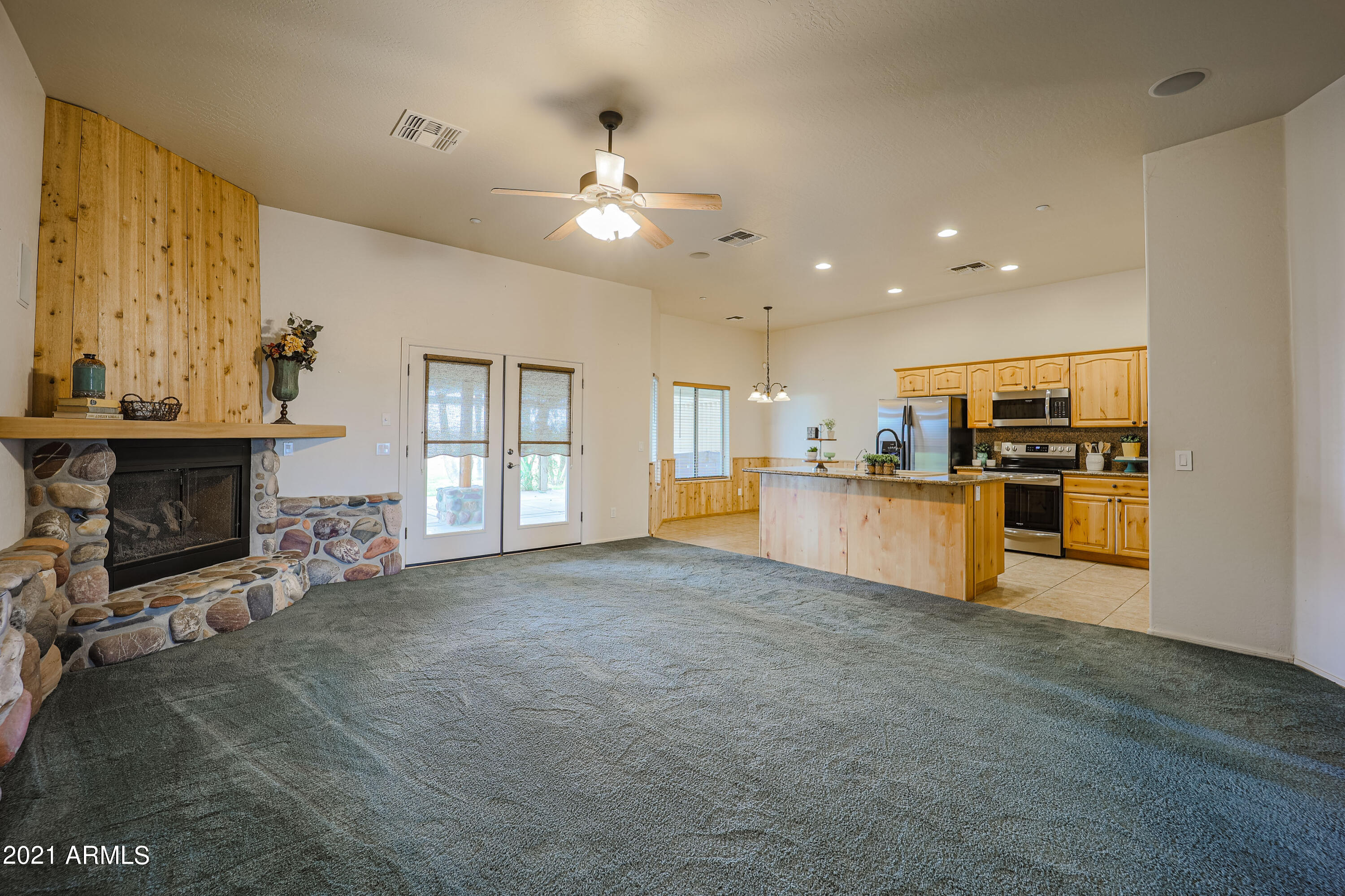 22834 Shumway Farm Road Buckeye, AZ 85326 - Photo 8 of 47 Family Room/Kitchen