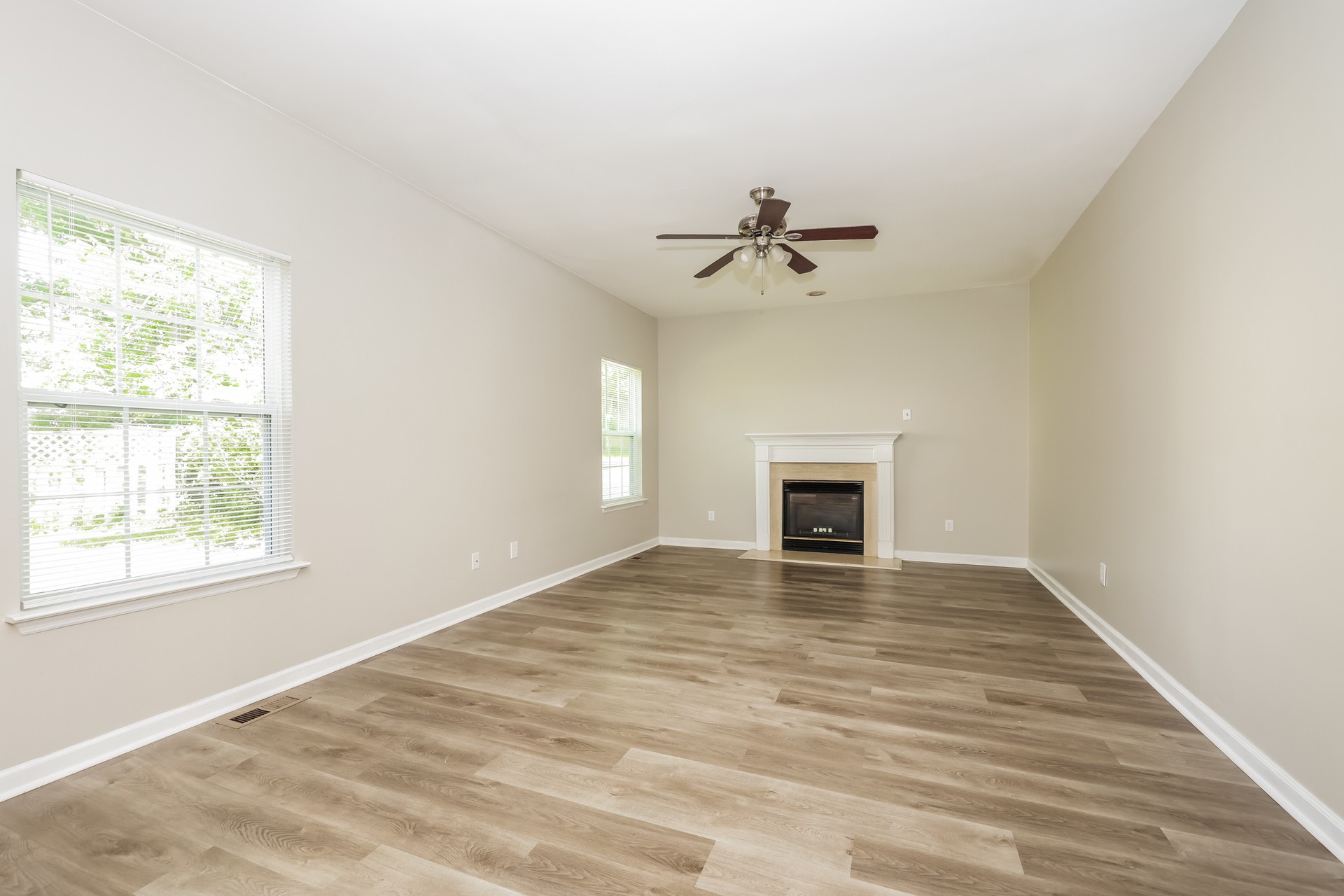 6104 Bentwood Drive Antioch, TN 37013 - Photo 3 of 17 a view of an empty room with a window and fireplace