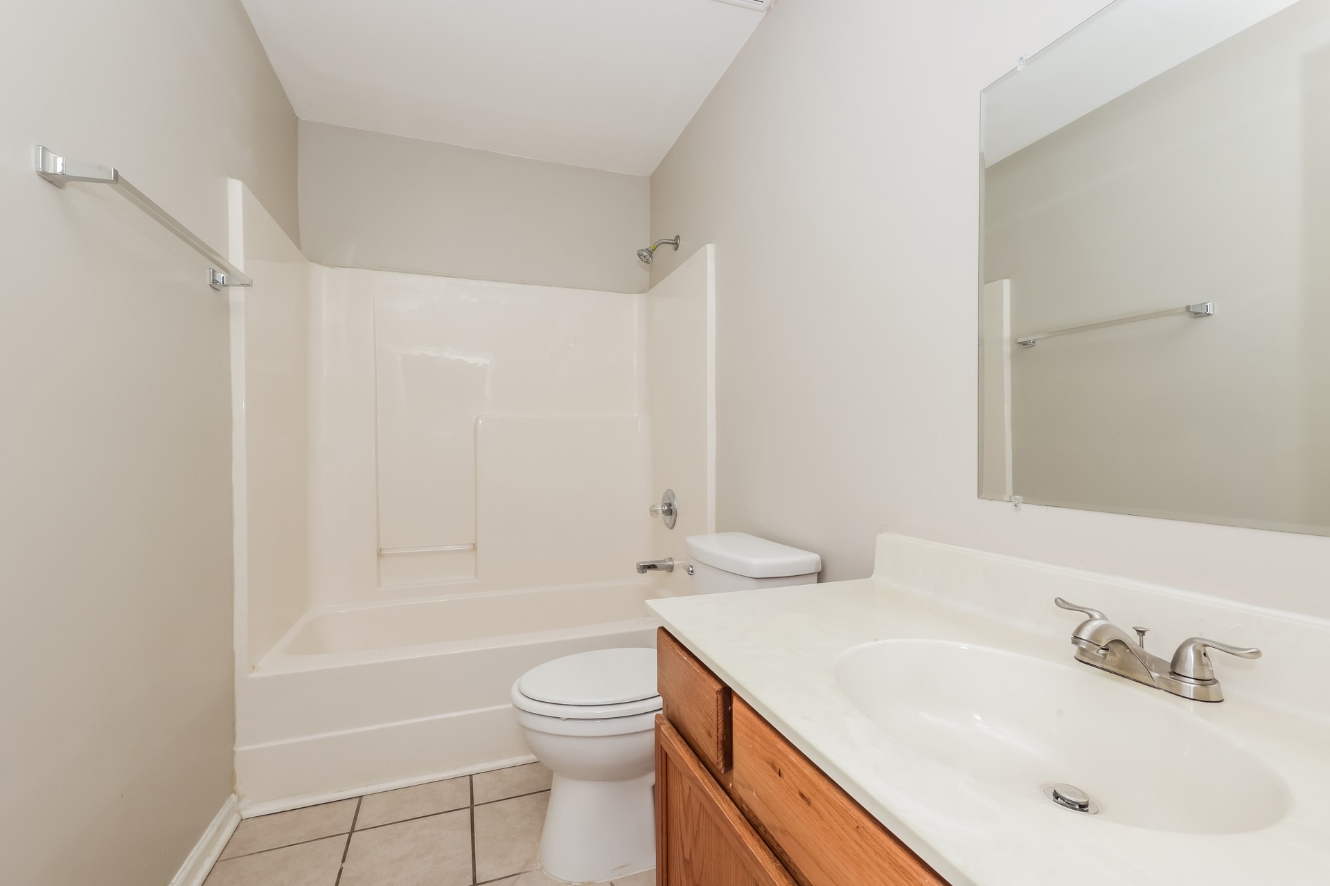 6104 Bentwood Drive Antioch, TN 37013 - Photo 7 of 17 a bathroom with a sink a toilet and shower