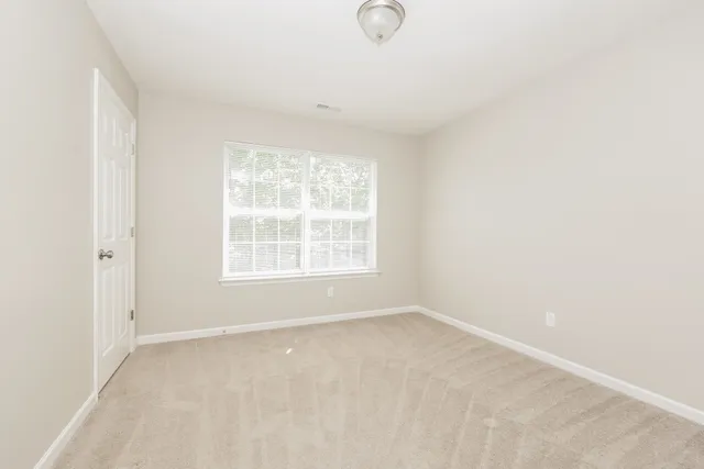 an empty room with a window