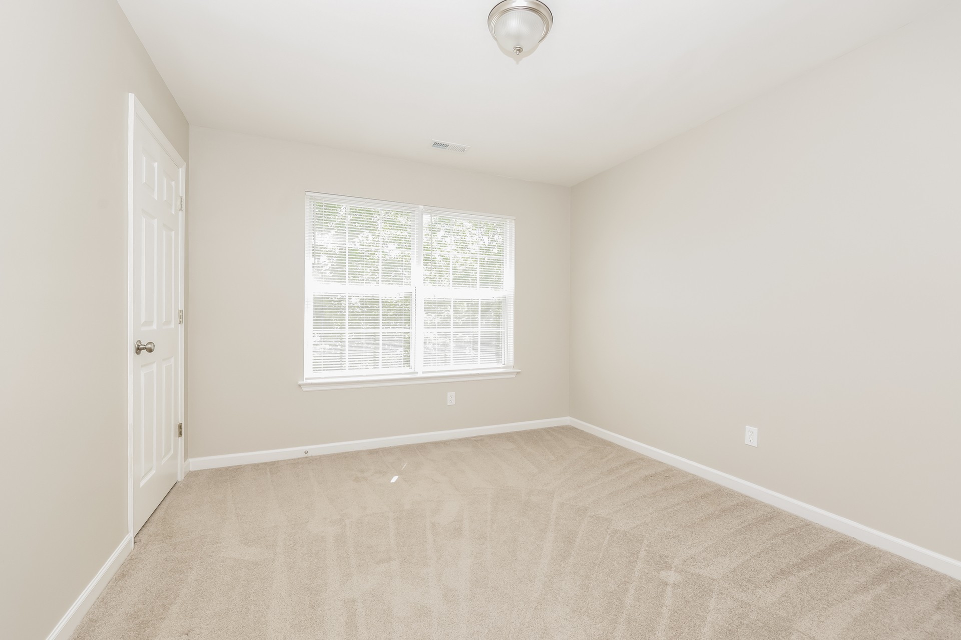 6104 Bentwood Drive Antioch, TN 37013 - Photo 8 of 17 an empty room with a window