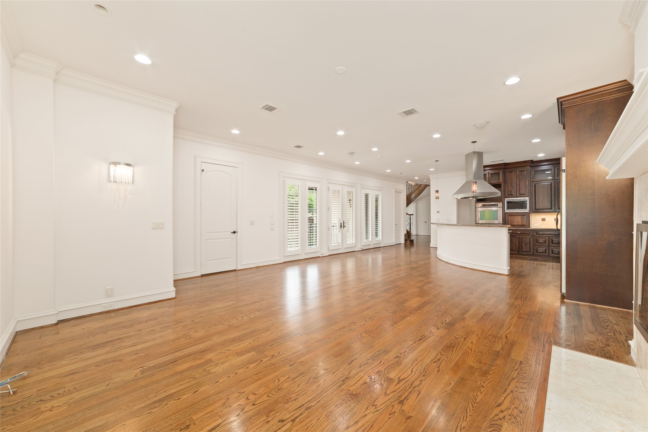 4102 Gramercy Street Houston, TX 77025 - Photo 8 of 35 a view of a kitchen with cabinets and wooden floor