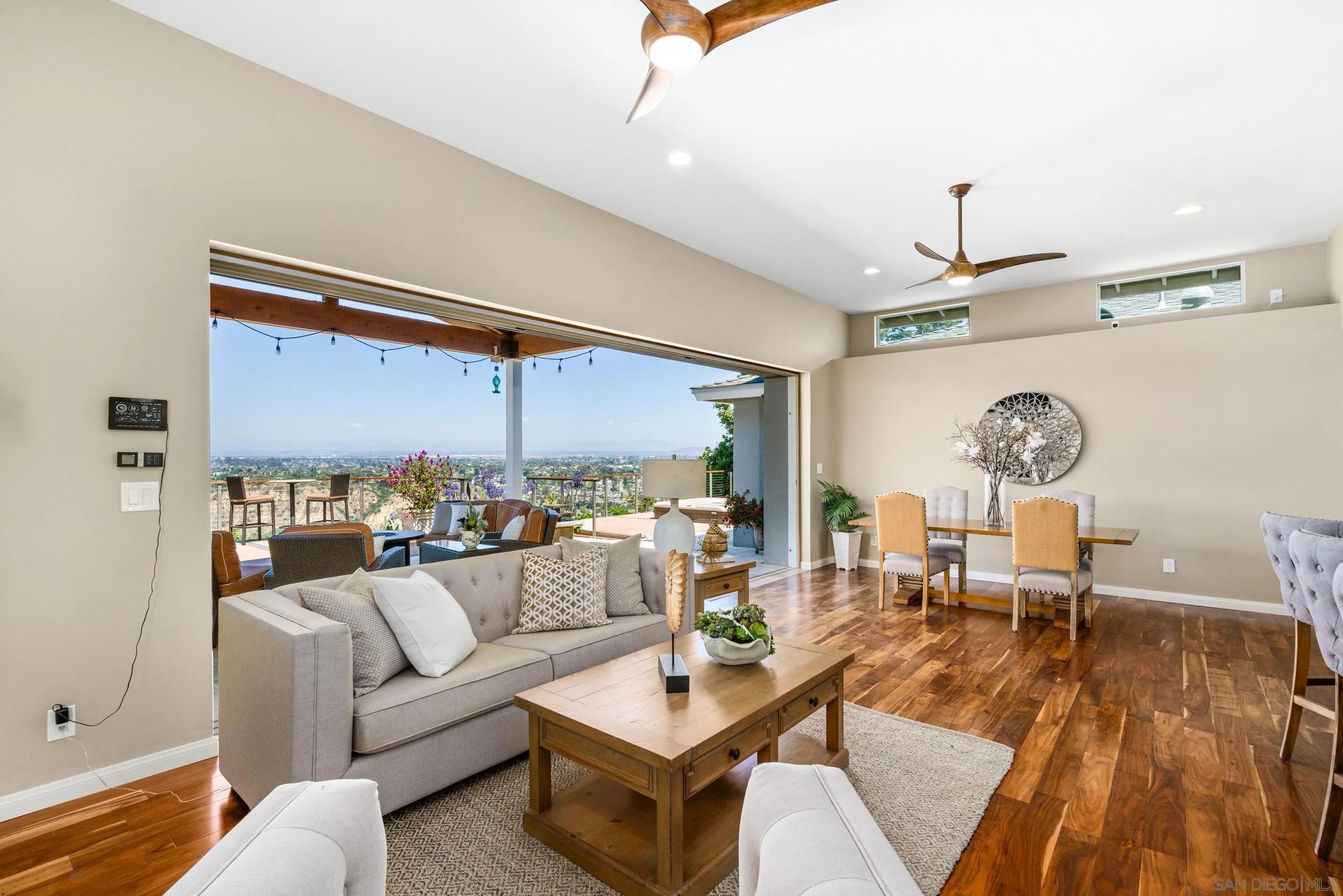 5785 Soledad Mountain Road La Jolla, CA 92037 - Photo 13 of 50 a living room with furniture and a large window
