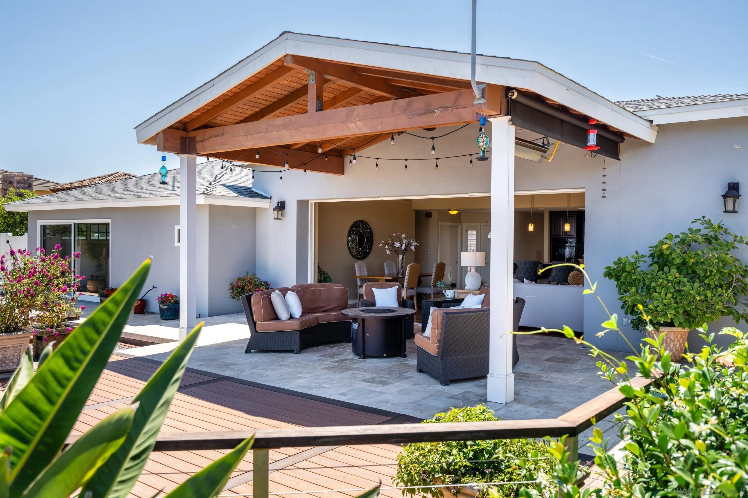 5785 Soledad Mountain Road La Jolla, CA 92037 - Photo 17 of 50 a view of the patio with couches table and chairs