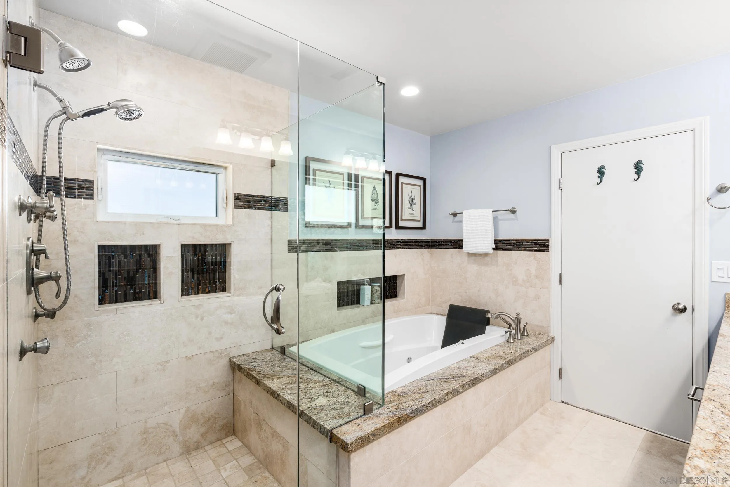 5785 Soledad Mountain Road La Jolla, CA 92037 - Photo 30 of 50 a living room with fireplace furniture and a flat screen tv