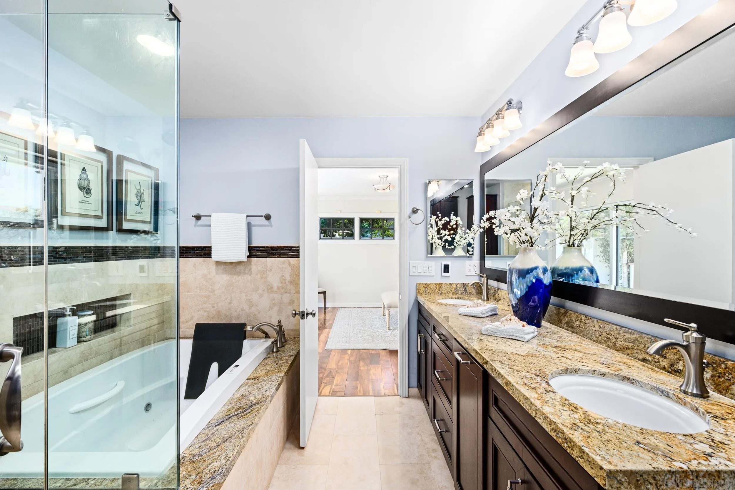 5785 Soledad Mountain Road La Jolla, CA 92037 - Photo 32 of 50 a kitchen with stainless steel appliances granite countertop a sink stove and refrigerator