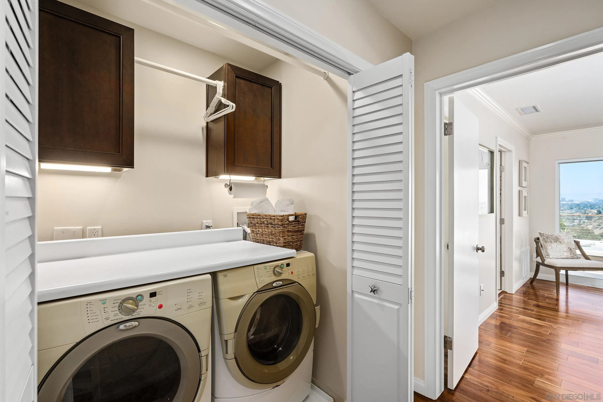 5785 Soledad Mountain Road La Jolla, CA 92037 - Photo 35 of 50 a view of a hallway with washer and dryer