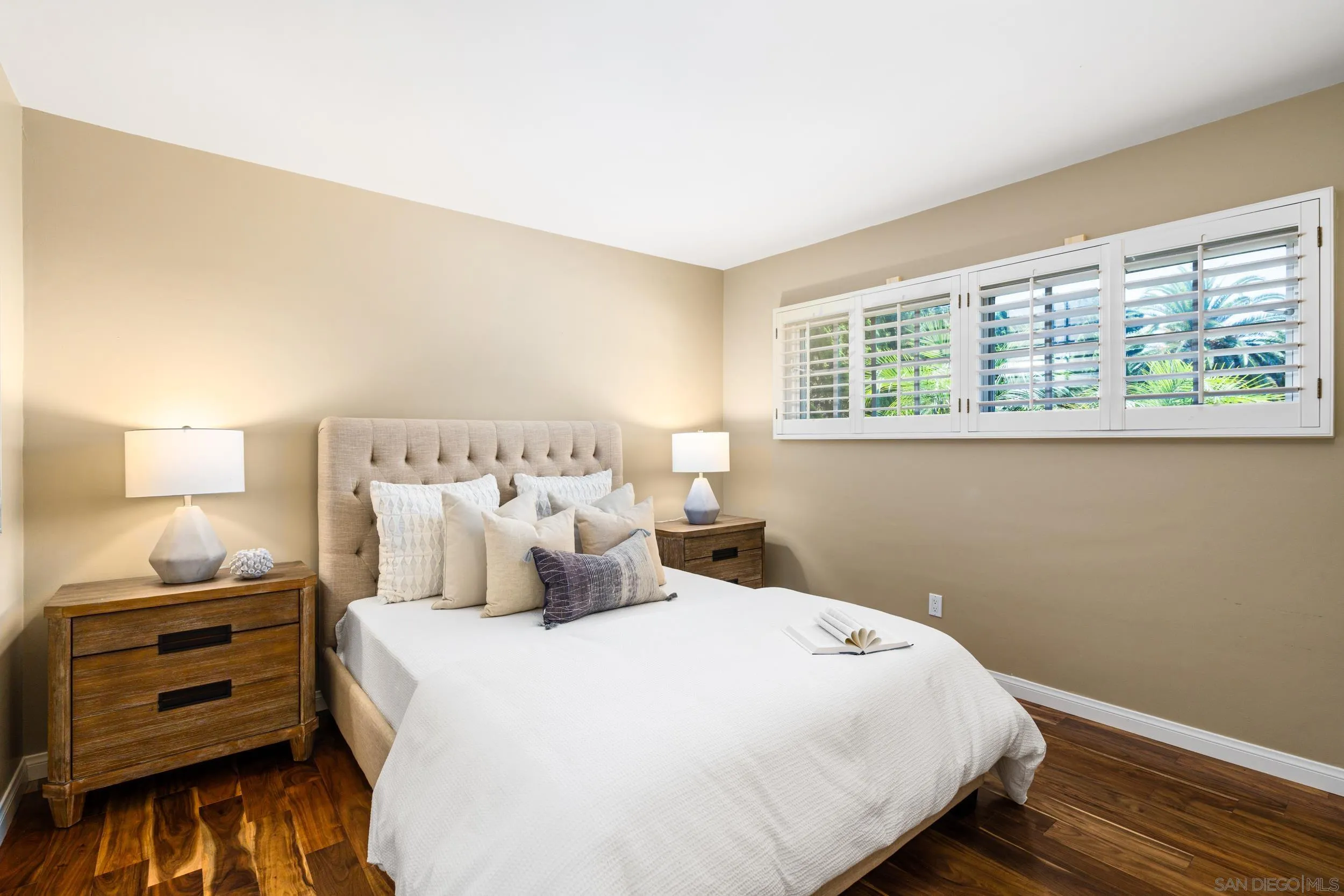 5785 Soledad Mountain Road La Jolla, CA 92037 - Photo 38 of 50 a bedroom with a bed and a window