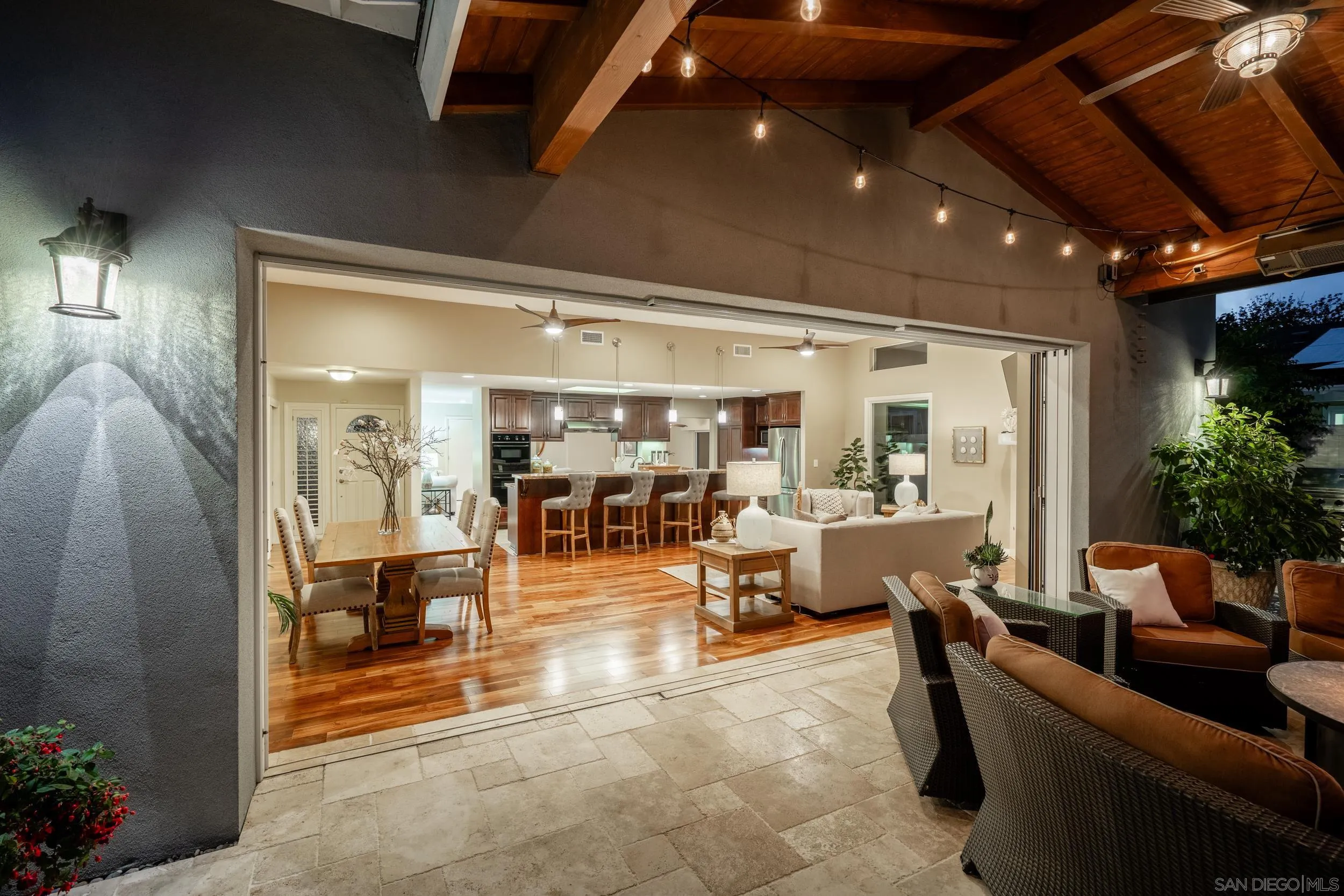 5785 Soledad Mountain Road La Jolla, CA 92037 - Photo 39 of 50 a living room with furniture and potted plants