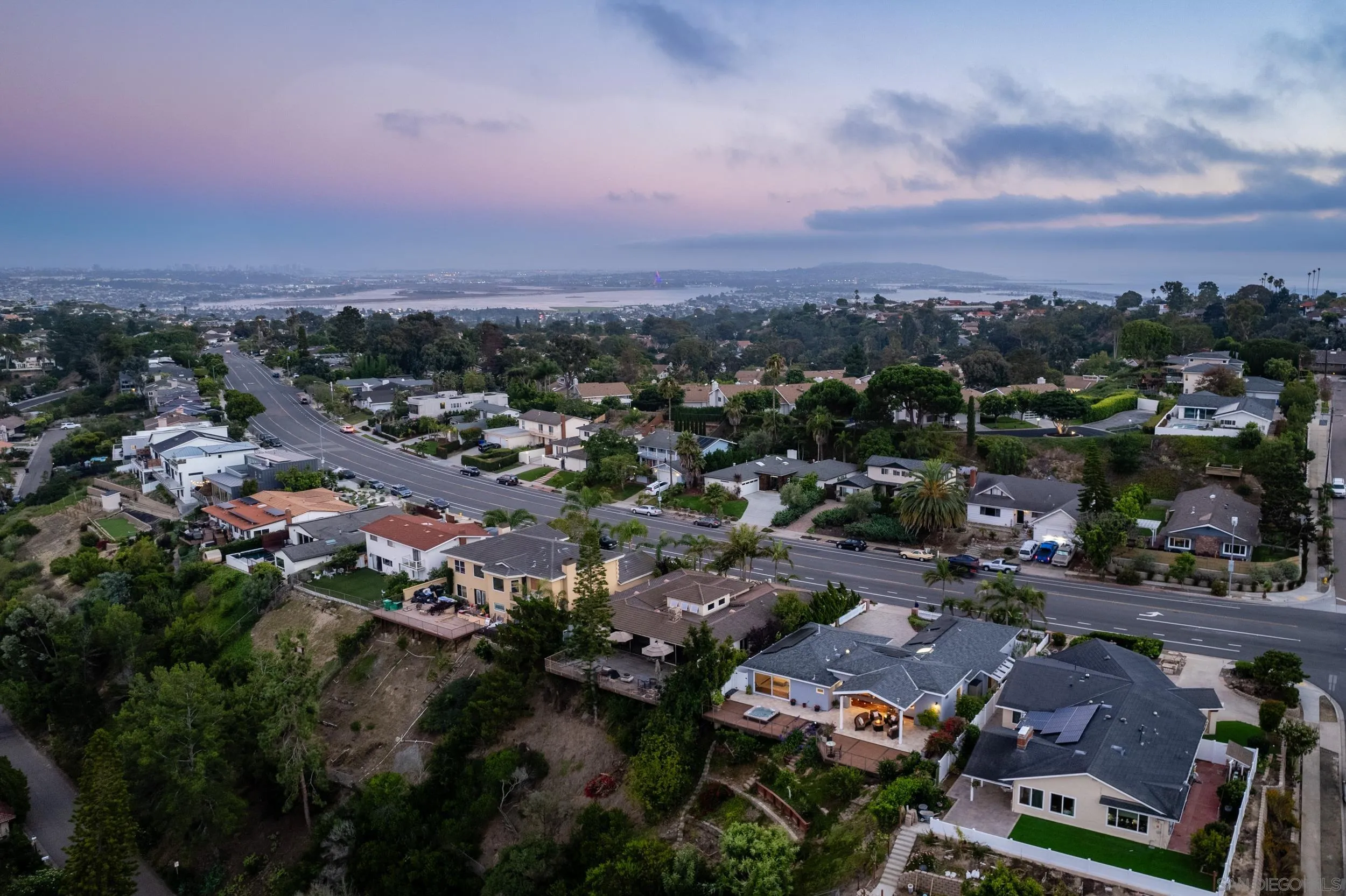 5785 Soledad Mountain Road La Jolla, CA 92037 - Photo 45 of 50 an aerial view of a city with lots of residential buildings and mountain view in back