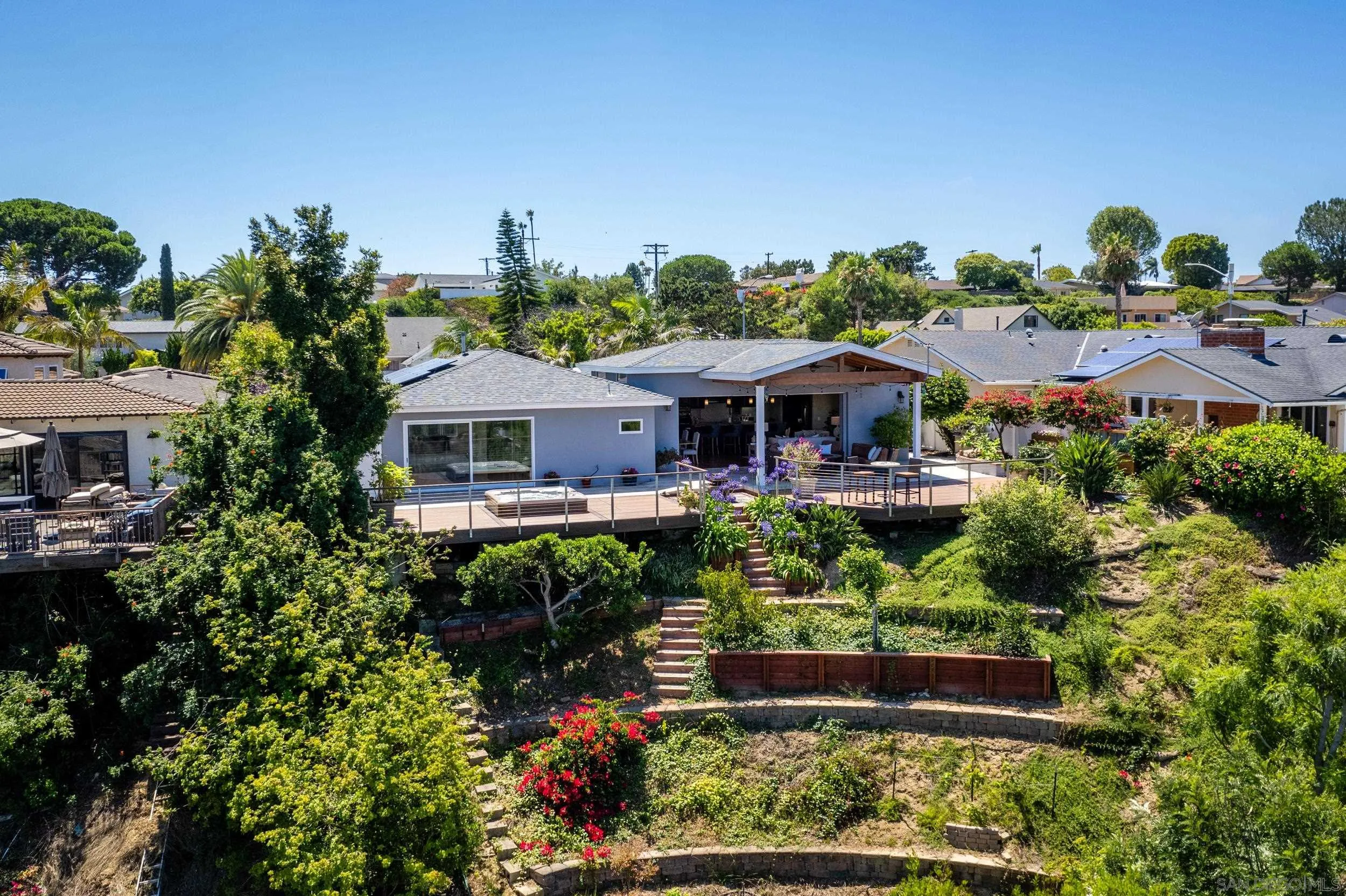 5785 Soledad Mountain Road La Jolla, CA 92037 - Photo 46 of 50 a front view of a house with a yard