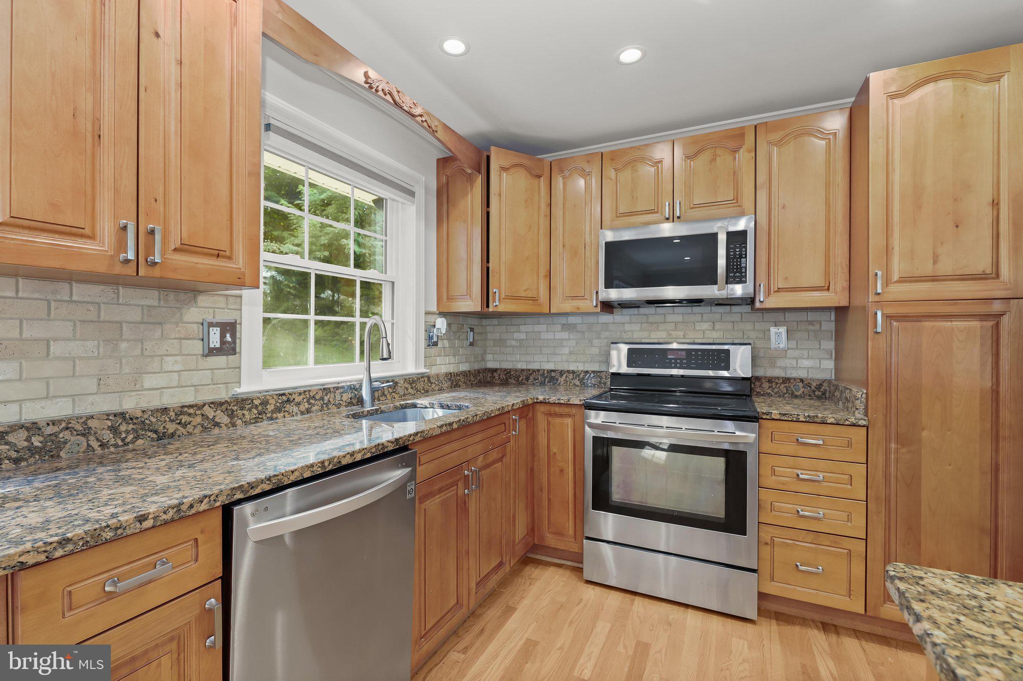8533 High Ridge Road Ellicott City, MD 21043 - Photo 4 of 47 Sleek Stainless Steel Appliances