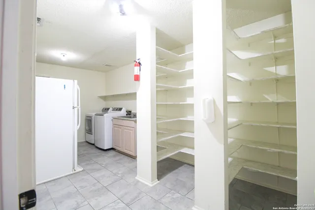 a view of storage and utility room