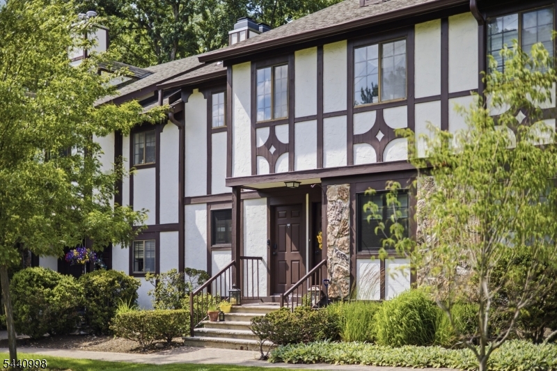 609 Mark Twain Way Mahwah, NJ 07430 - Photo 38 of 40 a front view of a house with garden