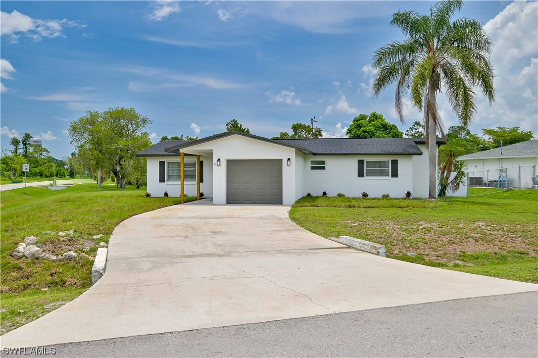 11 Illinois Road Lehigh Acres, FL 33936 - Photo 1 of 36 Gallery Image 1