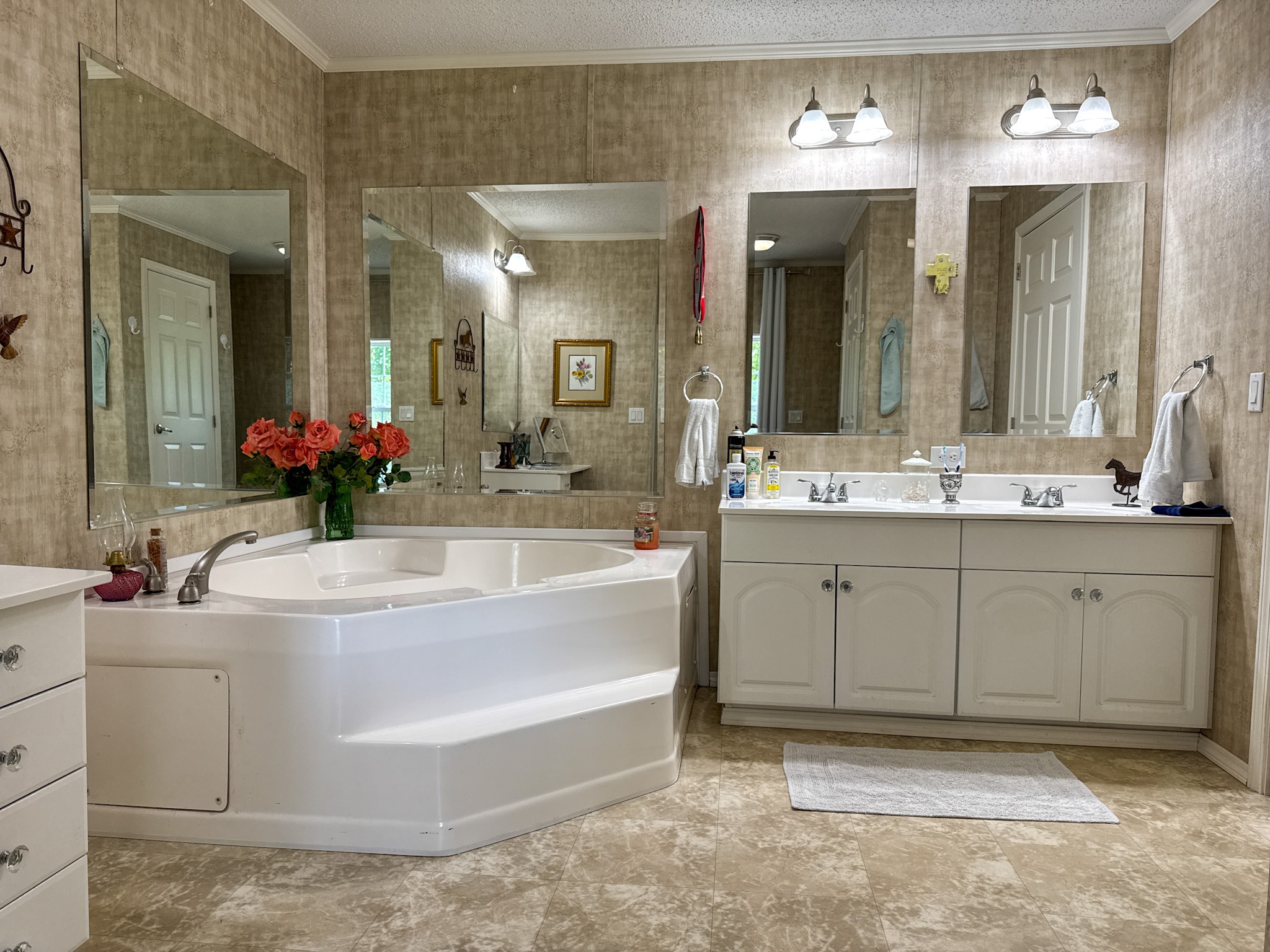 4791 Guys Chewalla Road Ramer, TN 38367 - Photo 17 of 77 a spacious bathroom with a tub sink and a mirror