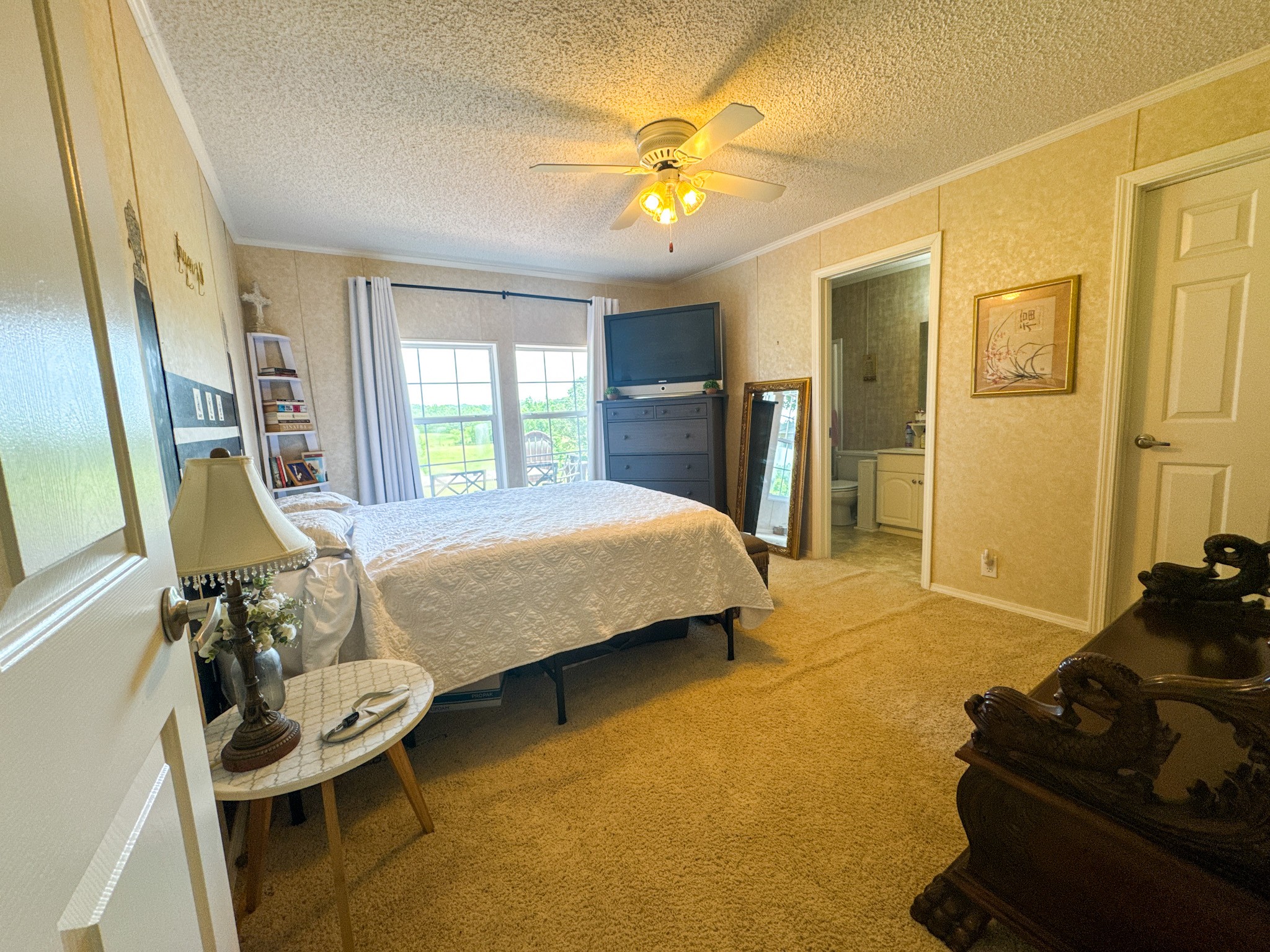 4791 Guys Chewalla Road Ramer, TN 38367 - Photo 19 of 77 a bedroom with a bed and wooden floor
