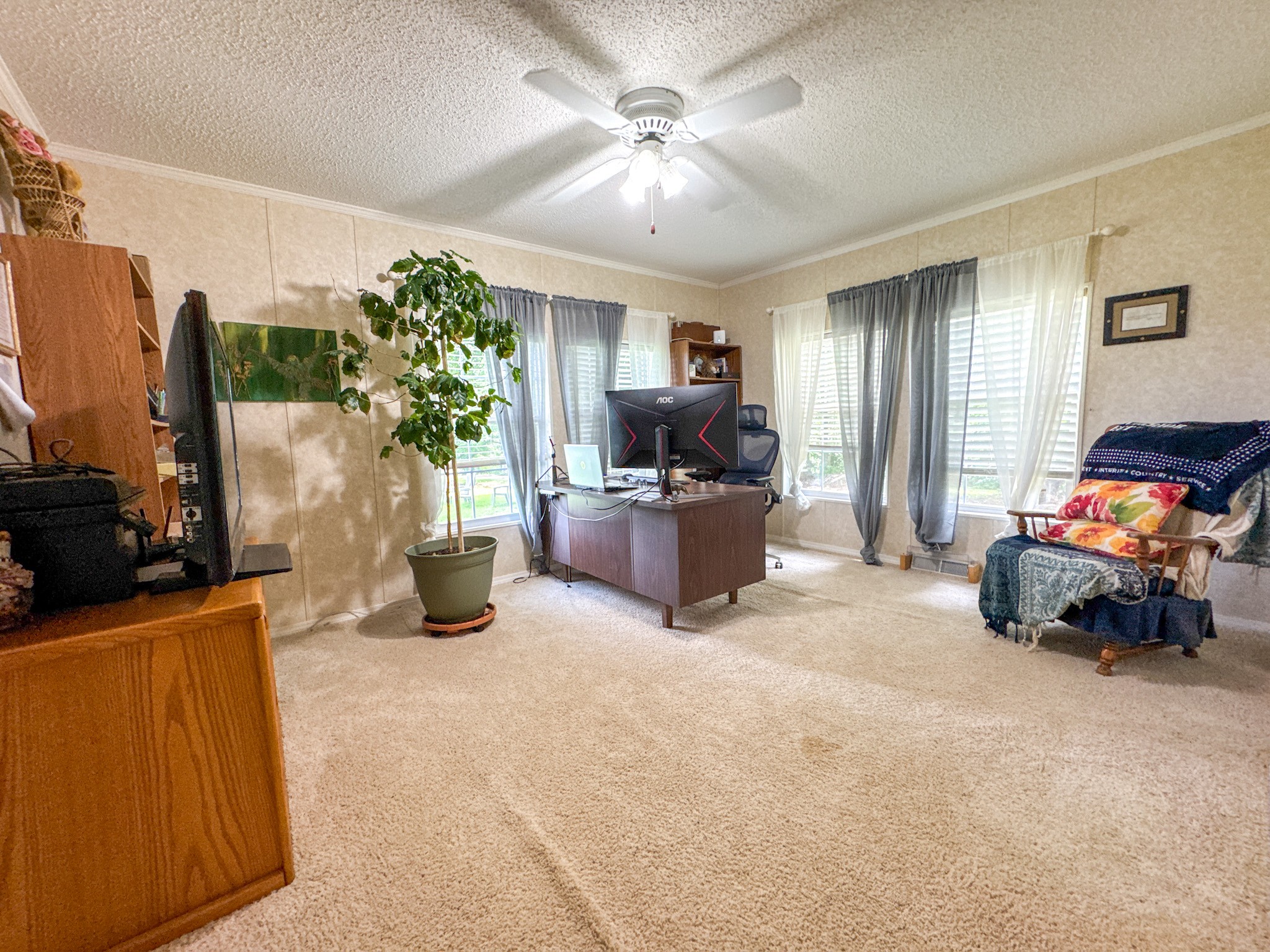 4791 Guys Chewalla Road Ramer, TN 38367 - Photo 21 of 77 a bed room with furniture and a flat screen tv