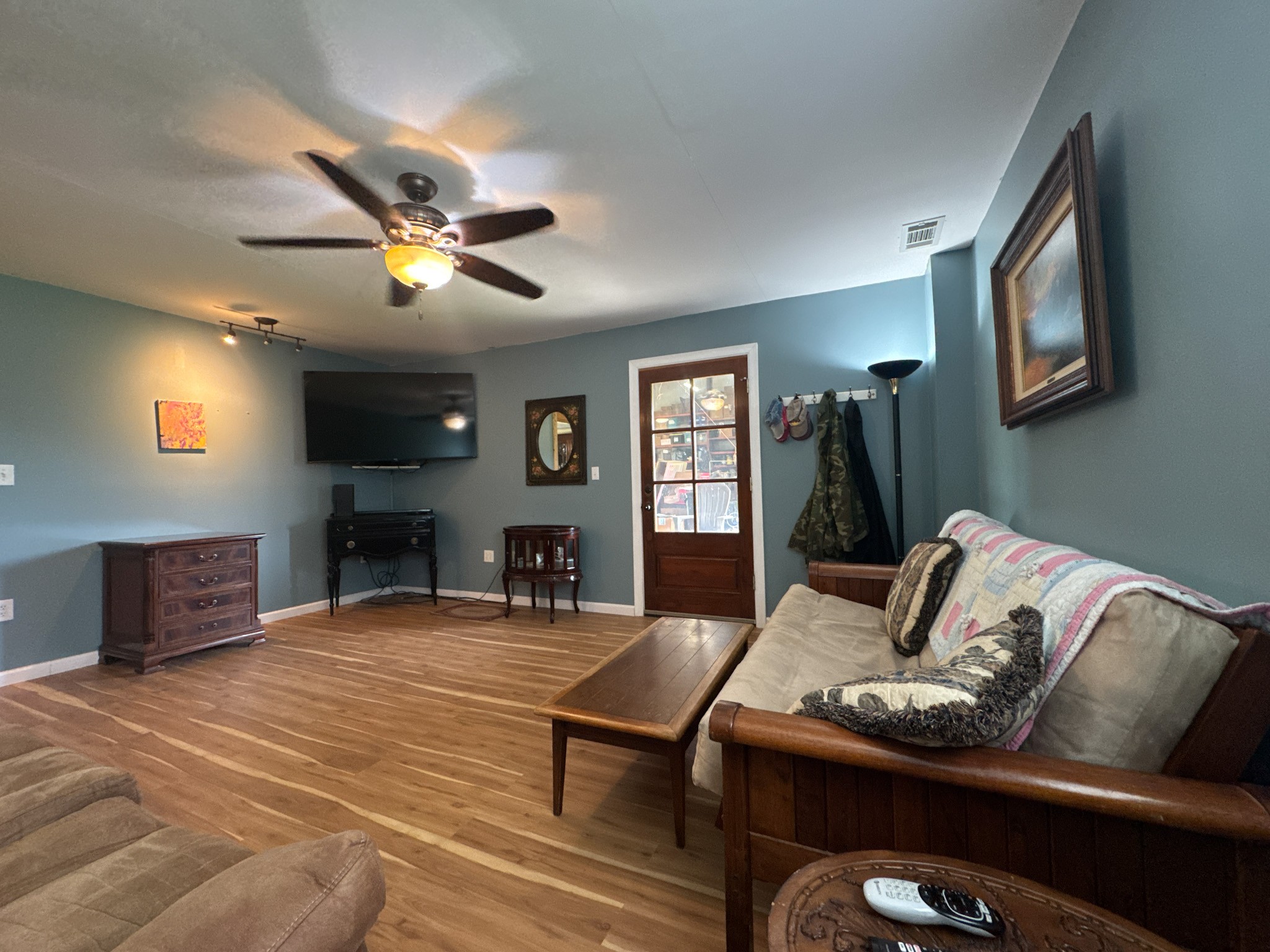 4791 Guys Chewalla Road Ramer, TN 38367 - Photo 25 of 77 a living room with furniture and wooden floor