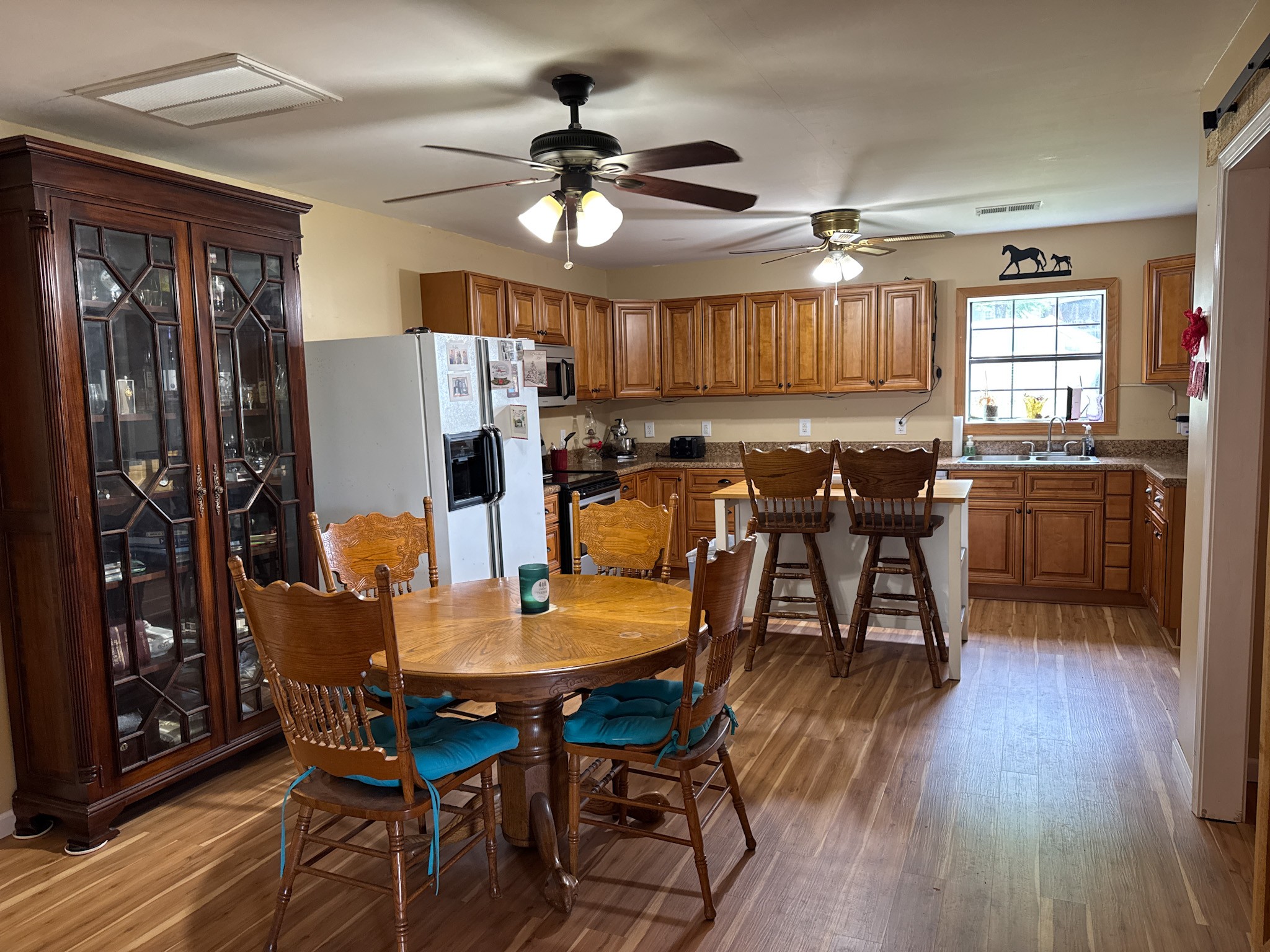 4791 Guys Chewalla Road Ramer, TN 38367 - Photo 27 of 77 a view of a dining room with furniture window and wooden floor